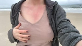 Hot blond MILF mom flashing her boobs at the beach!